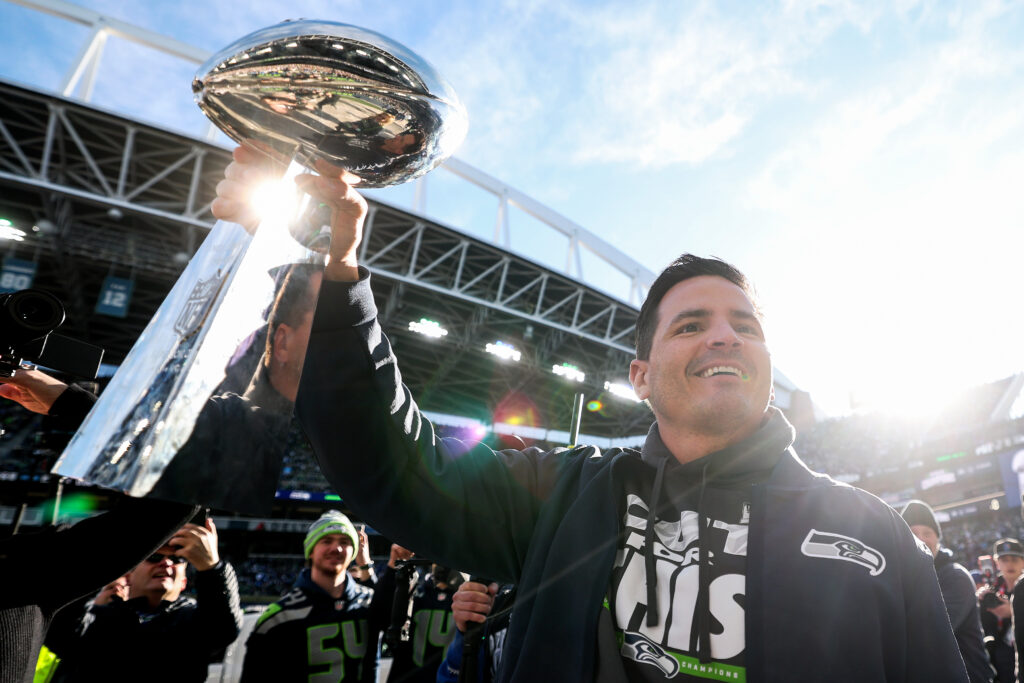 Head coach Mike McDonald of the Seattle Seahawks celebrates with fans during the Seattle Seahawks Super Bowl LX victory celebration and parade at Lumen Field.