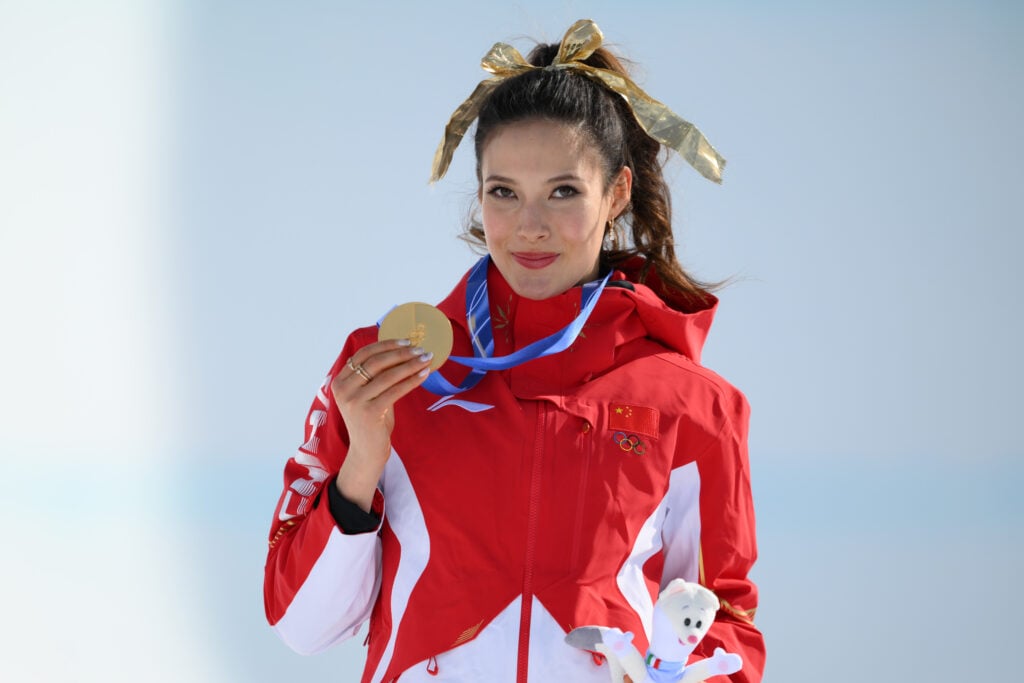 Eileen Gu celebrates with her gold medal at the 2026 Winter Olympics