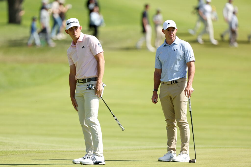 Jacob Bridgeman and Rory McIlroy look on during the final round of the Genesis Invitational