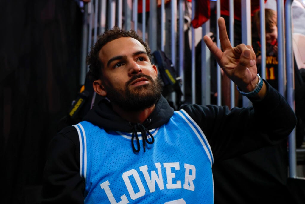 Trae Young #3 of the Washington Wizards gestures to fans following the Atlanta Hawks 126-96 victory at State Farm Arena on February 26, 2026 in Atlanta, Georgia.