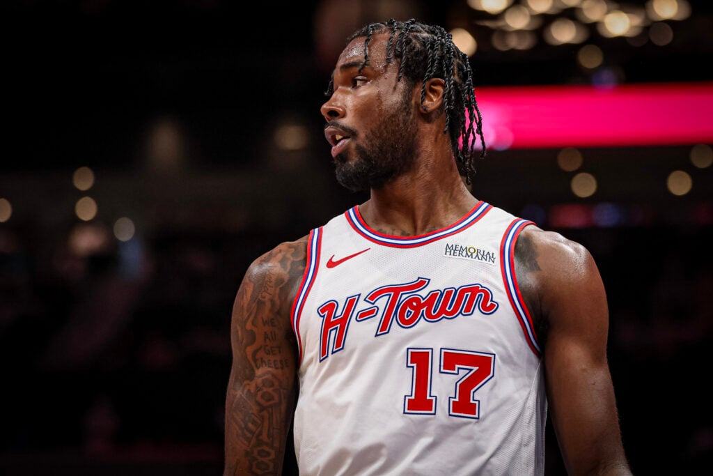 Tari Eason #17 of the Houston Rockets looks on during the first half of a basketball game against the Charlotte Hornets at Spectrum Center.