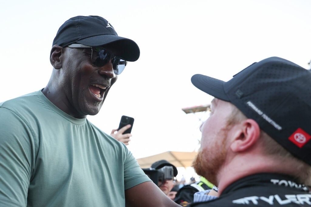 Tyler Reddick, driver of the #45 Chumba Casino Toyota, celebrates with Michael Jordan, NBA Hall of Famer and co-owner of 23XI Racing after winning his third race in a row to start the 2026 NASCAR season winning the NASCAR Cup Series DuraMax Grand Prix Powered by RelaDyne at Circuit of The Americas on March 01, 2026.