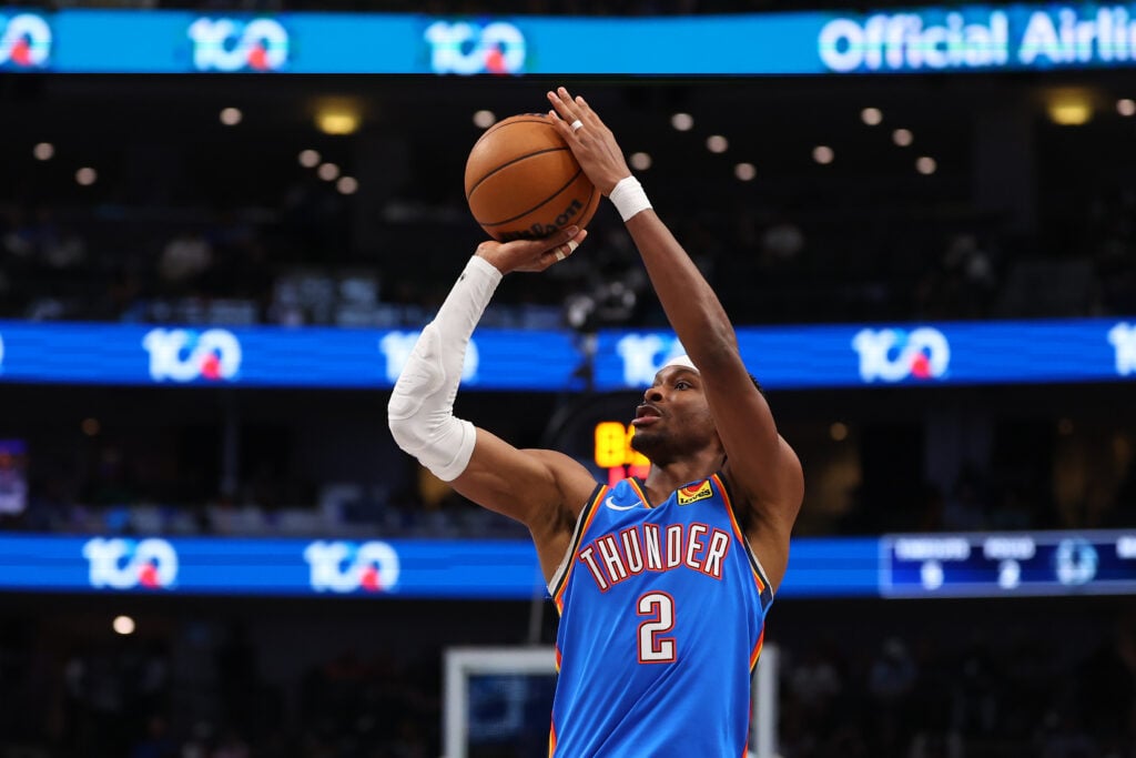 Shai Gilgeous-Alexander #2 of the Oklahoma City Thunder shoots during the third quarter against the Dallas Mavericks at American Airlines Center on March 01, 2026.