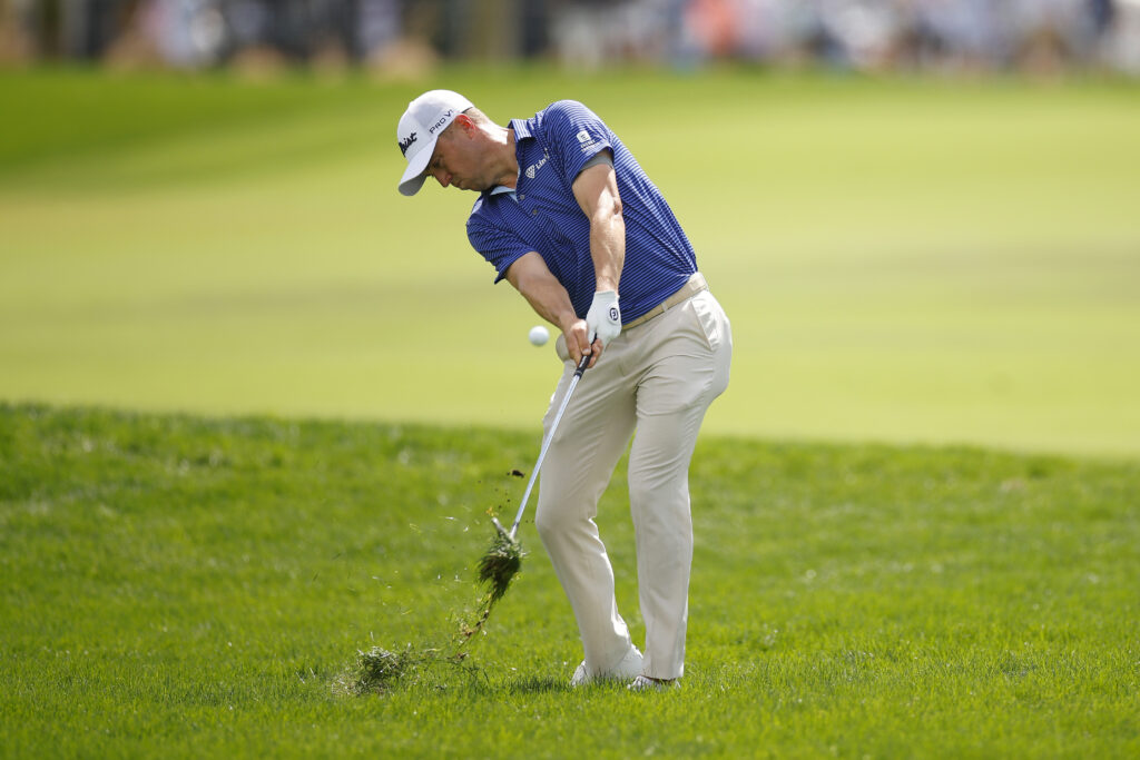 Justin Thomas of the United States plays an approach shot on the first hole during the first round of the Arnold Palmer Invitational