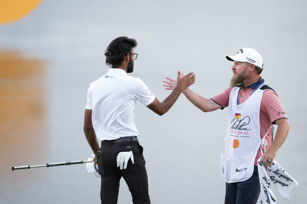 Akshay Bhatia celebrates with Joe Greiner after winning the Arnold Palmer Invitational