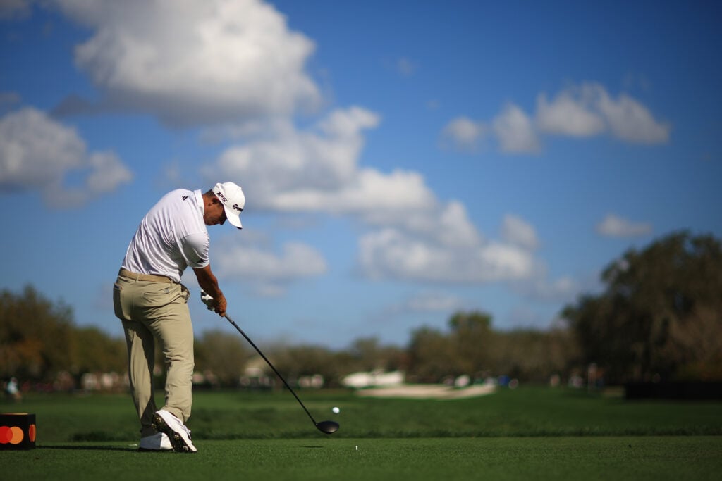 Collin Morikawa of the United States hits a tee shot on the 11th hole during the second round of the Arnold Palmer Invitational presented by Mastercard 2026 at Arnold Palmer Bay Hill Golf Course