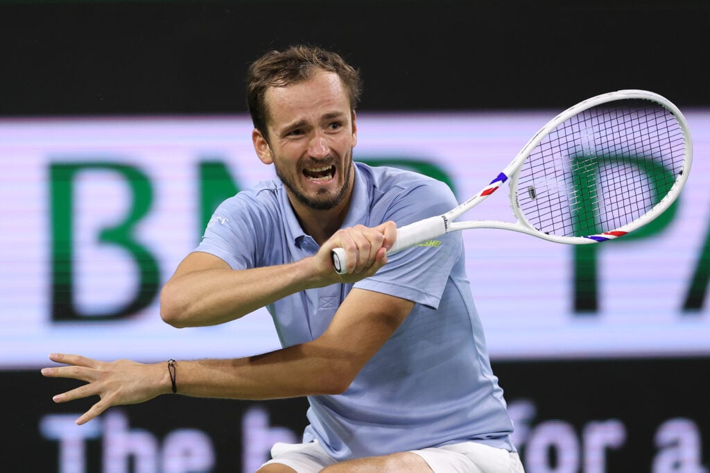 Daniil Medvedev returns a shot to Sabastian Baez of Argentina during Day 6 of the BNP Paribas Open at the Indian Wells Tennis Garden.