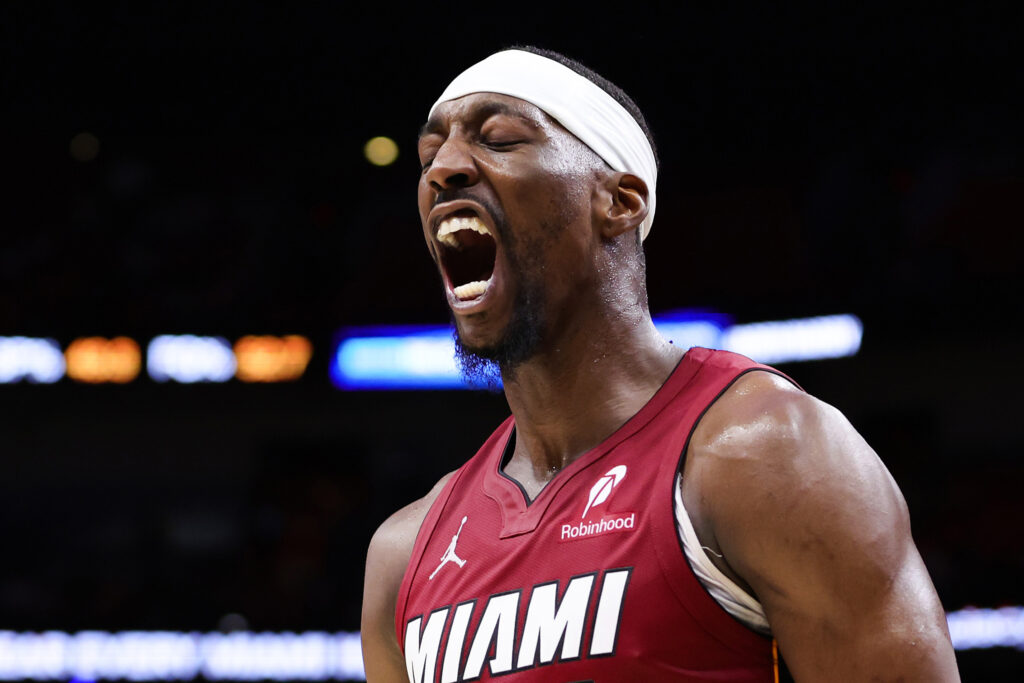 Bam Adebayo #13 of the Miami Heat celebrates during the fourth quarter of the game against the Washington Wizards at Kaseya Center.