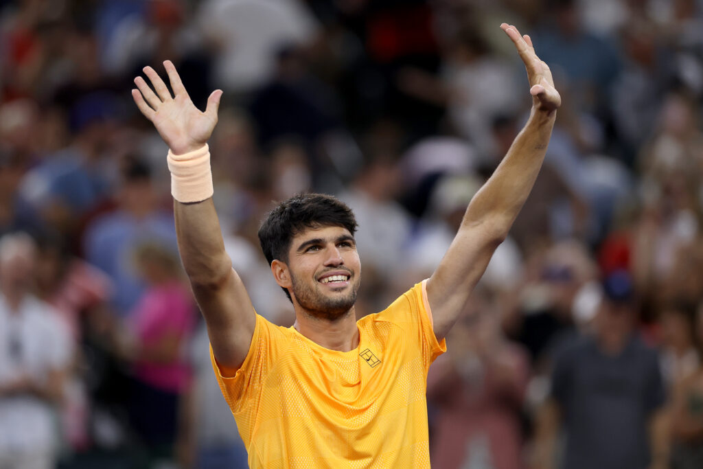 Carlos Alcareaz of Spain celerates his win over Cameron Norrie of Great Britain in the Quarter Finals during Day 9 of the BNP Paribas Open at the Indian Wells Tennis Garden.