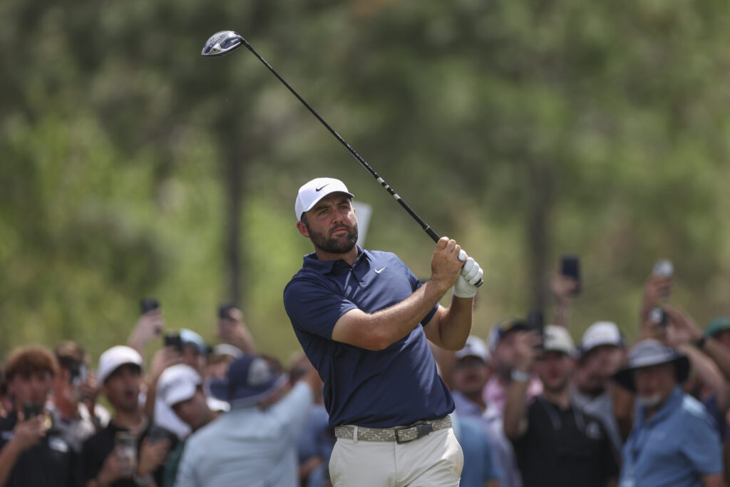 Scottie Scheffler hits his tee shot during the final round of The Players Championship at TPC Sawgrass