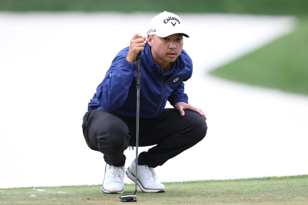 Min Woo Lee lines up a putt on the tenth green during the second round of THE PLAYERS Championship at TPC Sawgrass