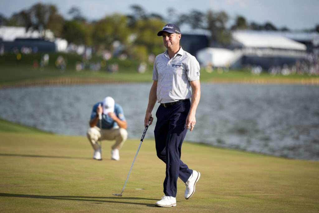 Justin Thomas reacts to a putt on the 18th hole during the final round of THE PLAYERS Championship at Stadium Course at TPC Sawgrass