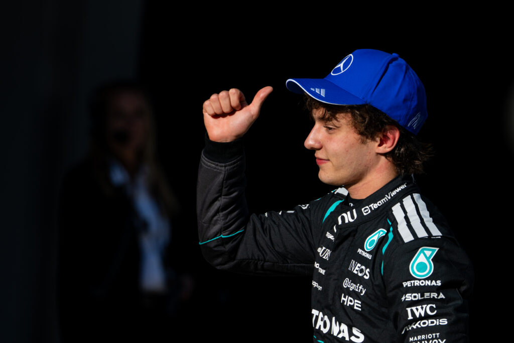 Pole position qualifier Andrea Kimi Antonelli of Italy and Mercedes AMG Petronas F1 Team celebrates in parc ferme during qualifying ahead of the F1 Grand Prix of China at Shanghai International Circuit.