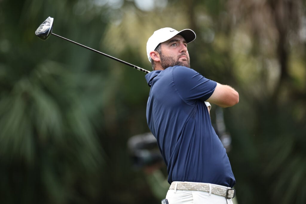 Scottie Scheffler hits a tee shot during the final round of The Players Championship