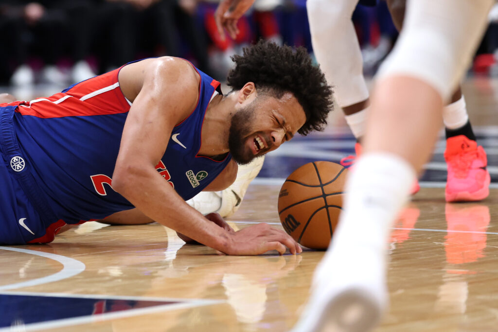 Cade Cunningham #2 of the Detroit Pistons reacts after colliding with Tre Johnson #12 of the of the Washington Wizards (not pictured) during the first half at Capital One Arena.