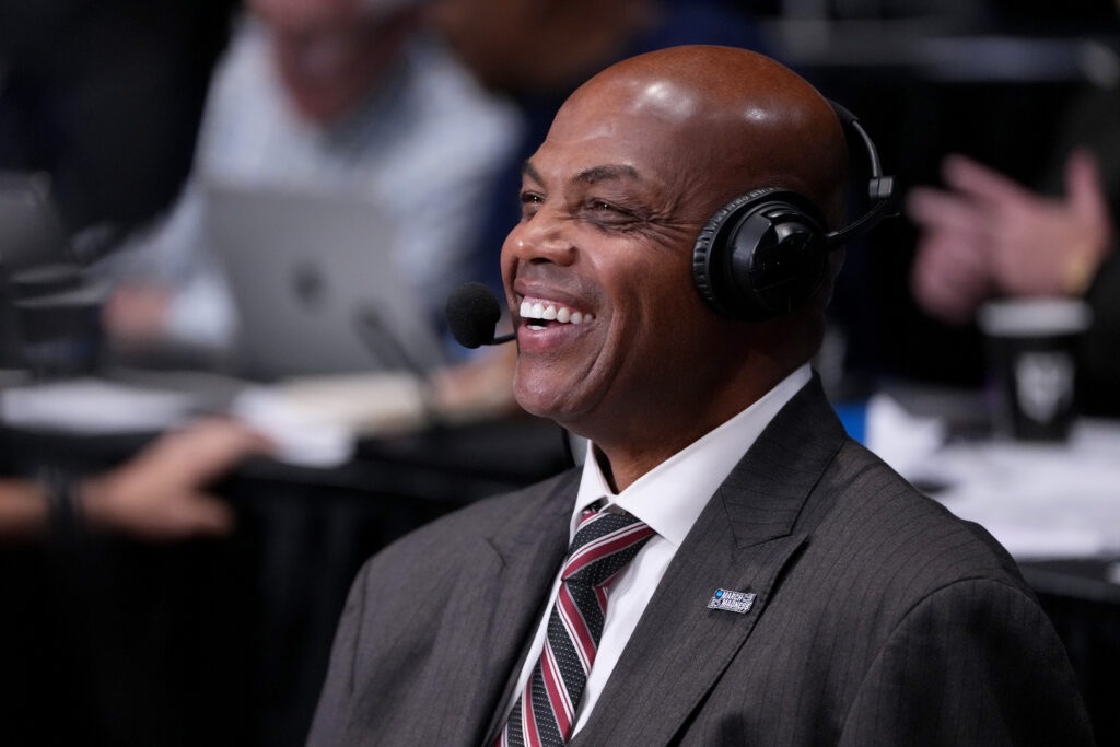 TV analyst Charles Barkley smiles prior to the first half in the First Four game between the NC State Wolfpack and the Texas Longhorns in the 2026 NCAA Men's Basketball Tournament at UD Arena.