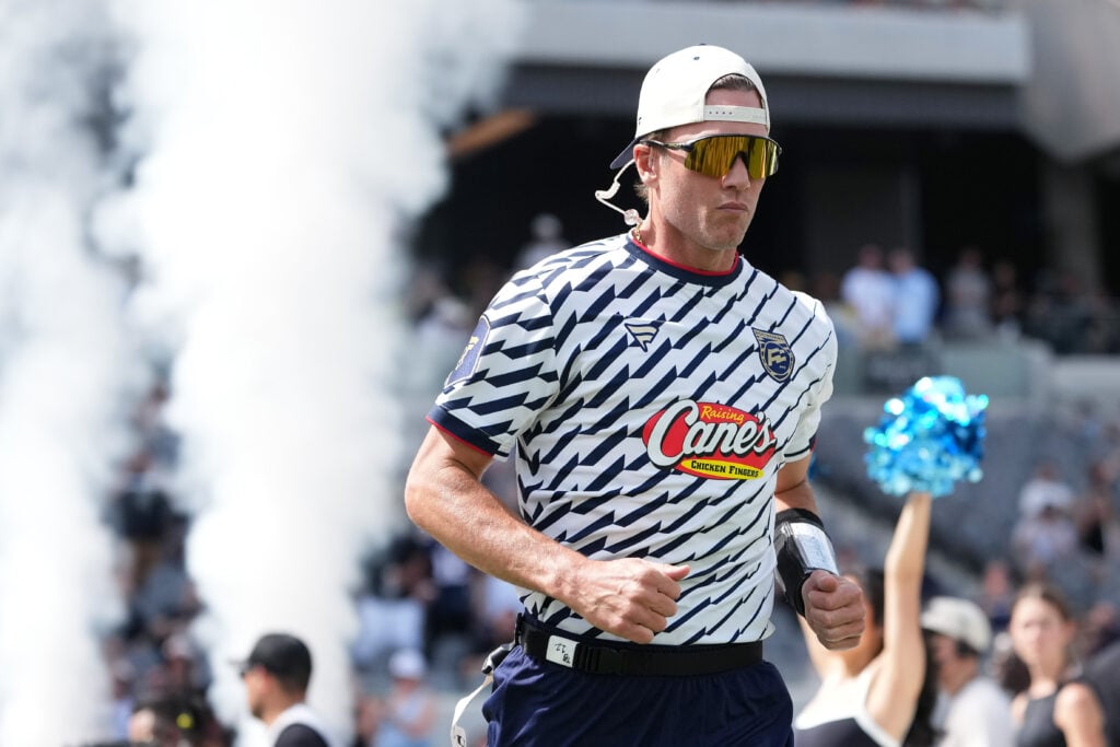 Tom Brady #12 of the Founders FFC takes the field during the Fanatics Flag Football Classic at BMO Stadium.