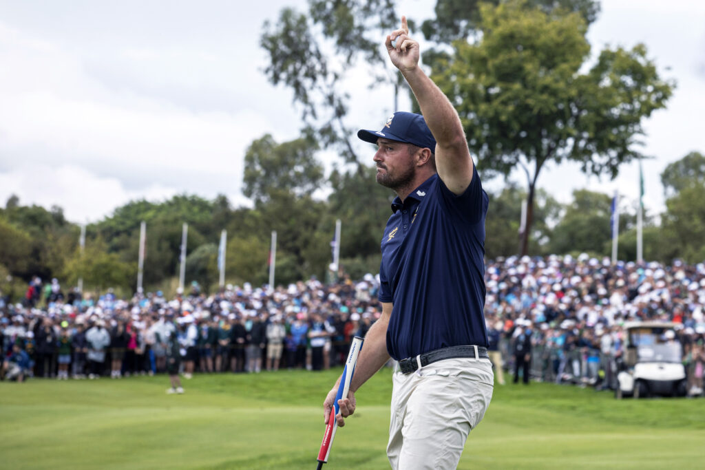 Bryson DeChambeau of Crushers GC raises his arm after playing his 4th shot on 18th hole and he won the 2026 LIV Golf South Africa title