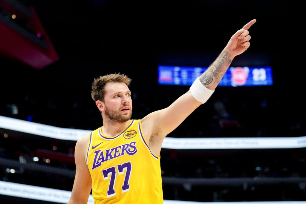 Luka Doncic #77 of the Los Angeles Lakers looks on and points against the Detroit Pistons at Little Caesars Arena.