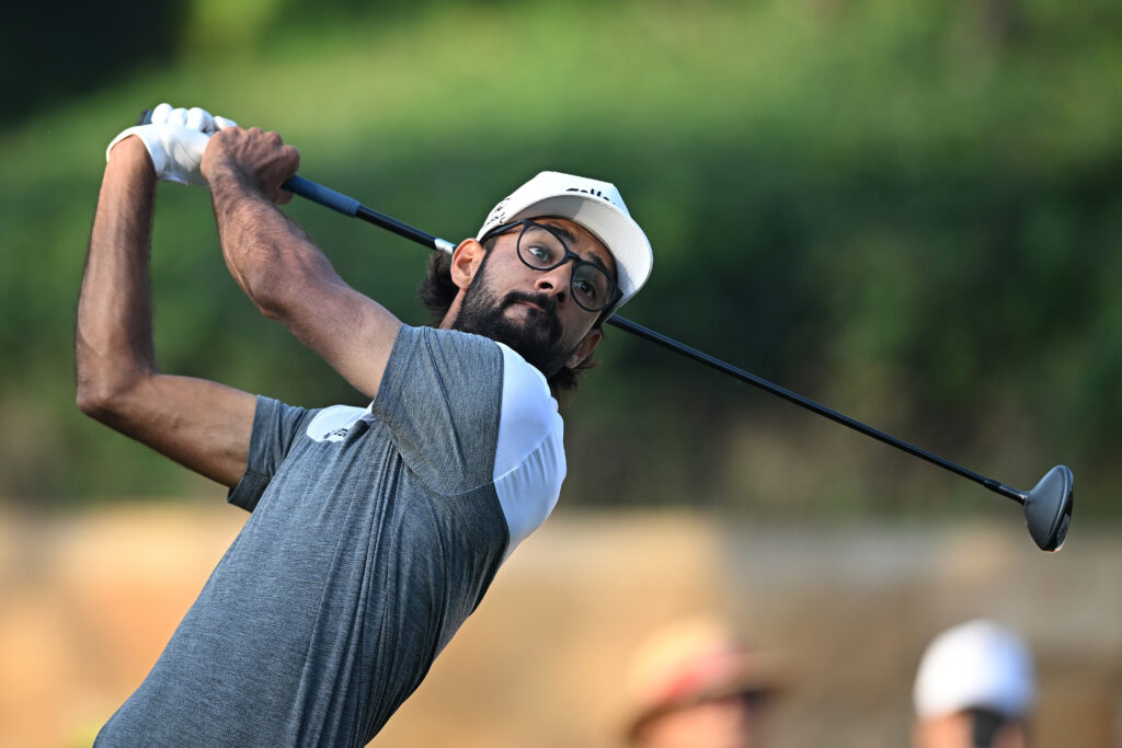 Akshay Bhatia hits his tee shot on the 10th hole on day one of the Hero Indian Open