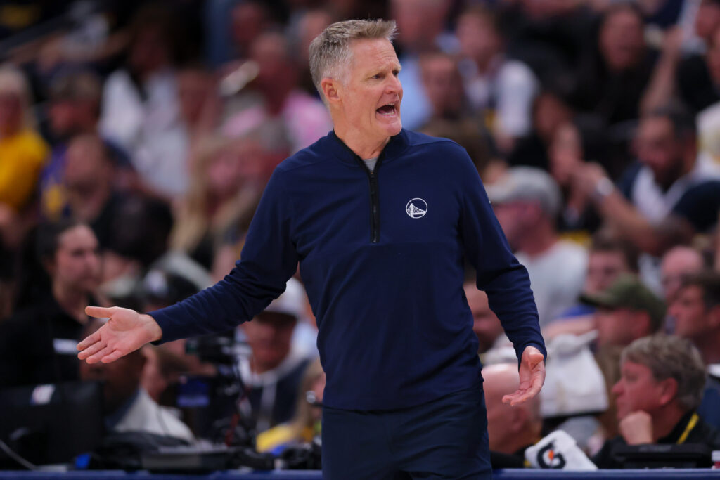Steve Kerr of the Golden State Warriors reacts on the sidelines during the second quarter against the Denver Nuggets at Ball Arena.