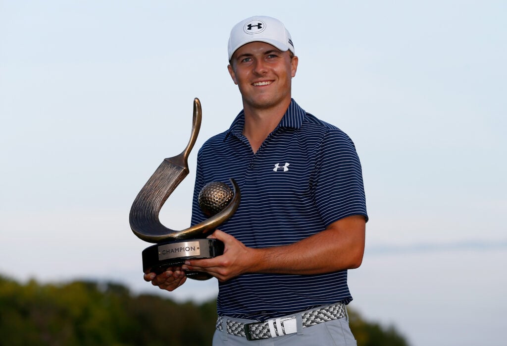 Jordan Spieth holds the trophy after clinching the Valspar Championship in 2015