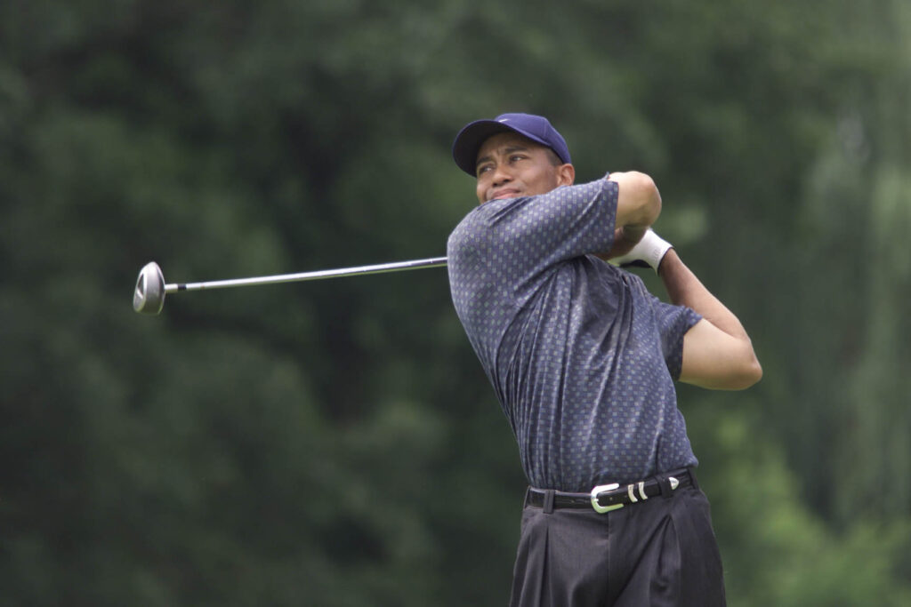 Tiger Woods hits a shot during the third round of the 2001 Advil Western Open
