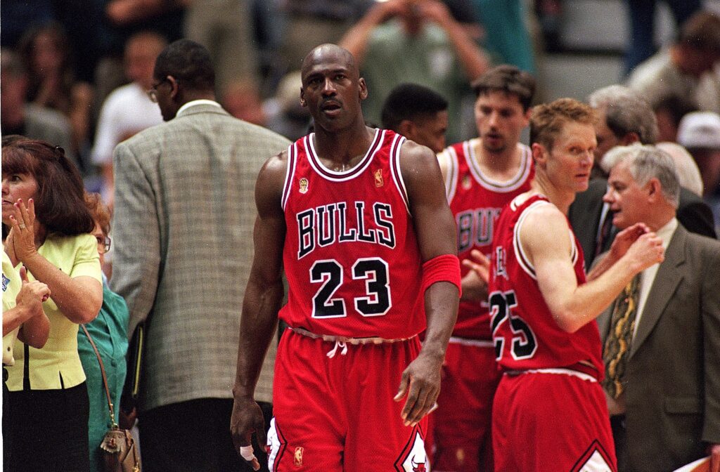 Michael Jordan #23 of the Chicago Bulls walks on the court during game five of the NBA Finals against the Utah Jazz at the Delta Center.