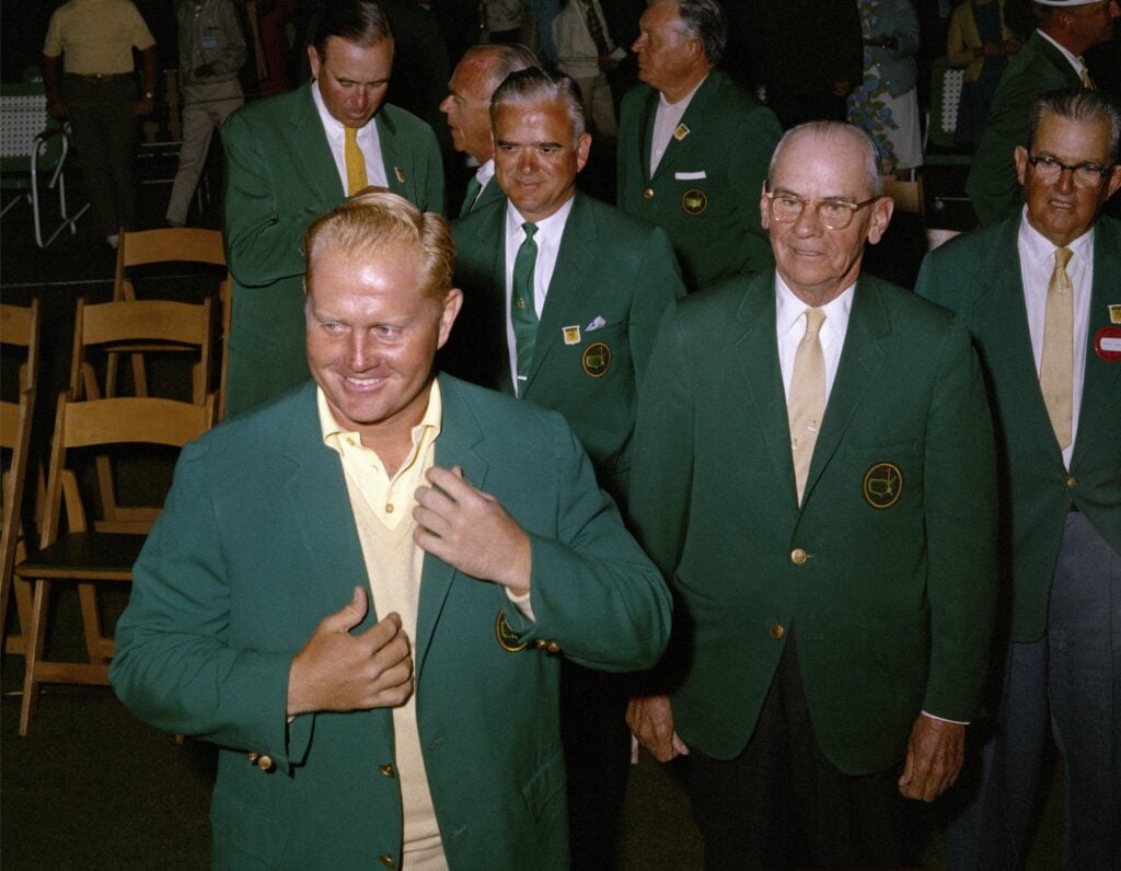Jack Nicklaus presents the green jacket to himself following The Masters in 1966