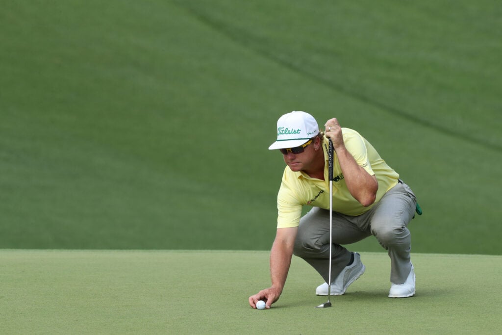 Charley Hoffman lines up a putt on the 10th green during the second round of the Masters at Augusta National