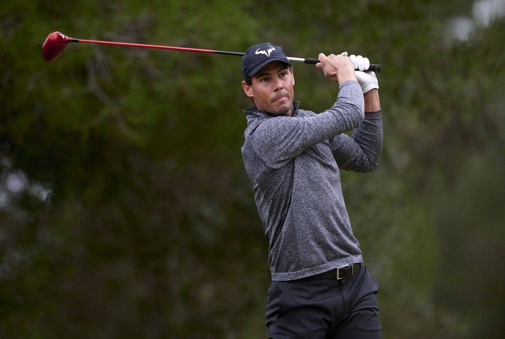 Rafael Nadal hits his tee-shot during the Individual Professional Baleares Championship at Golf Maioris