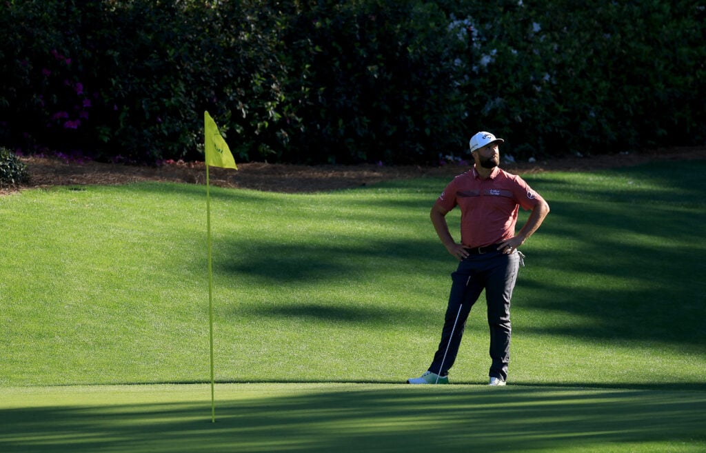 Jon Rahm waits to putt on the 12th hole during the final round of the 2023 Masters