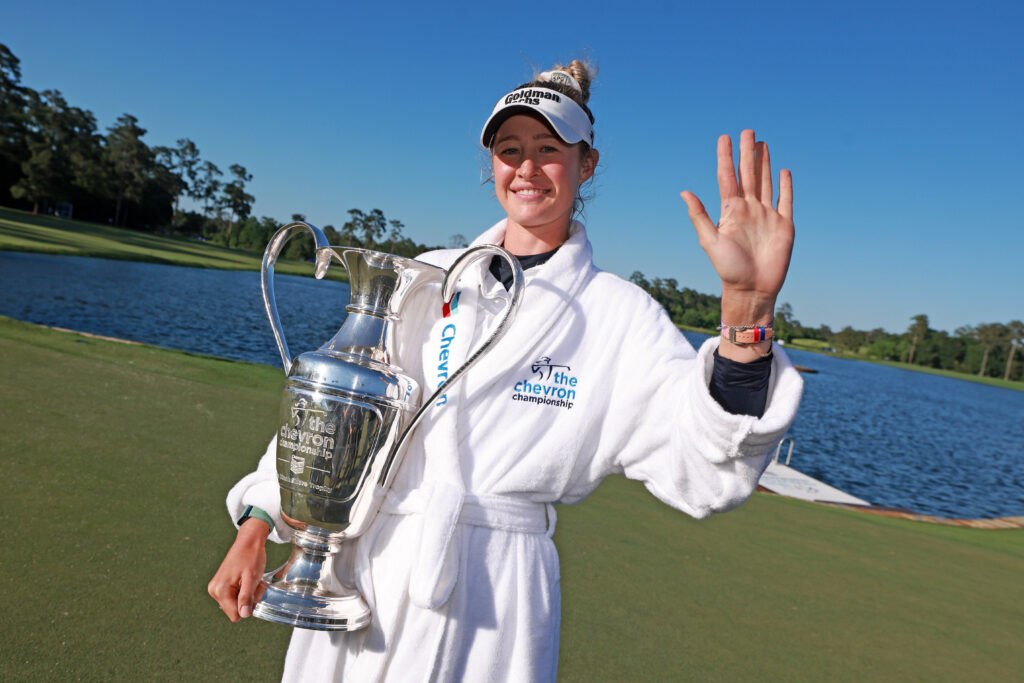 Nelly Korda of the United States celebrates with the trophy after winning The Chevron Championship at The Club at Carlton Woods