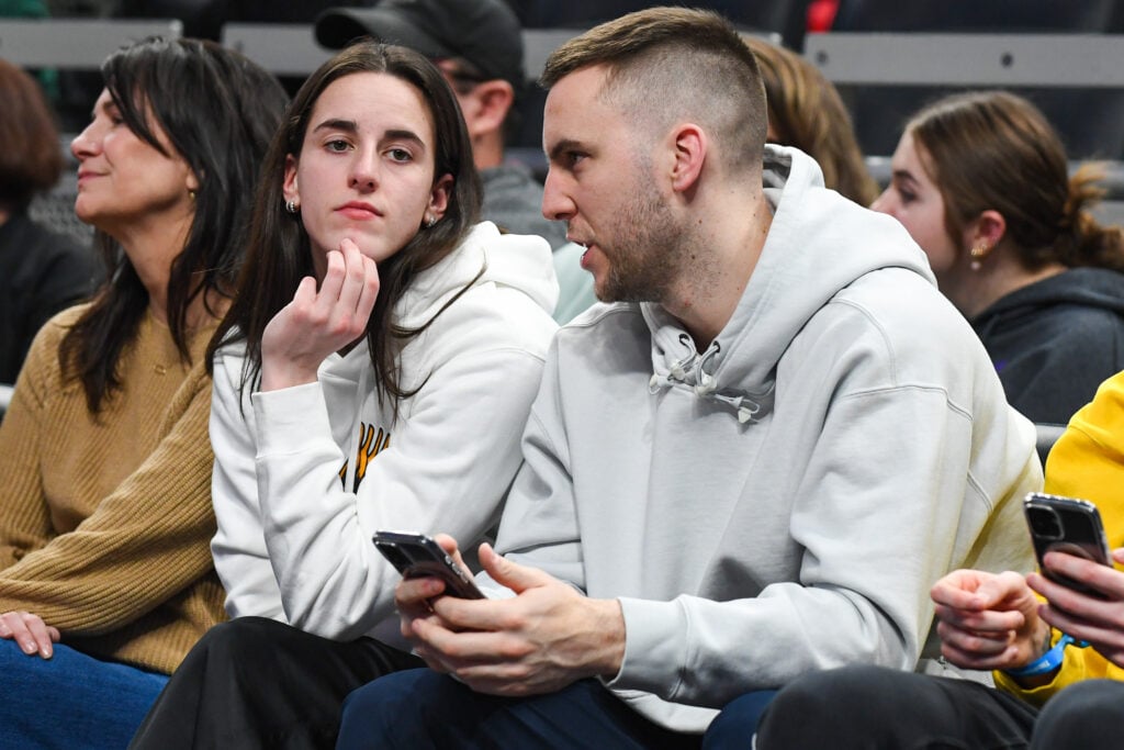 WNBA star and former Iowa Hawkeye Caitlin Clark (L) and boyfriend Connor McCaffery attend a Big Ten Women's Basketball Tournament - Second Round game between the Iowa Hawkeyes and the Michigan State Spartans at Gainbridge Fieldhouse.