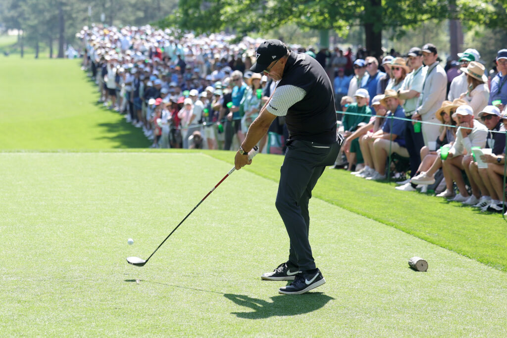 Phil Mickelson plays his shot from the seventh tee during the first round of the Masters at Augusta National in 2025