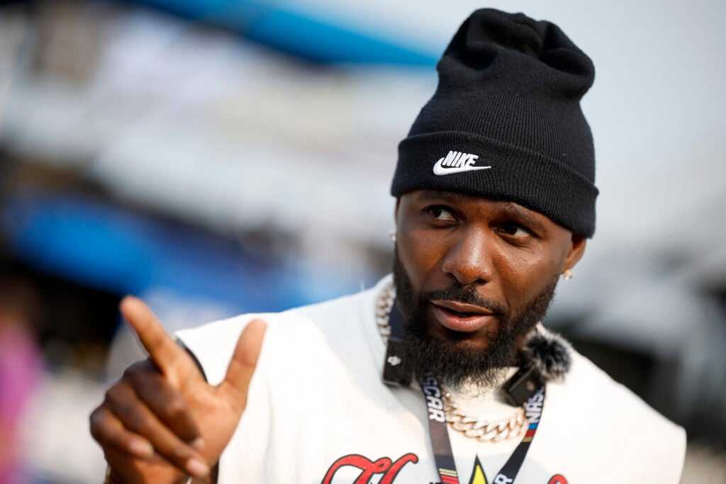 Former NFL player, Dez Bryant attends pre-race ceremonies prior to the NASCAR Cup Series Cracker Barrel 400 at Nashville Superspeedway.