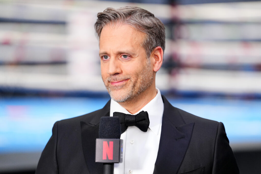 Commentator Max Kellerman looks on during a super middleweight bout on the undercard of the Canelo v Crawford event at Allegiant Stadium.