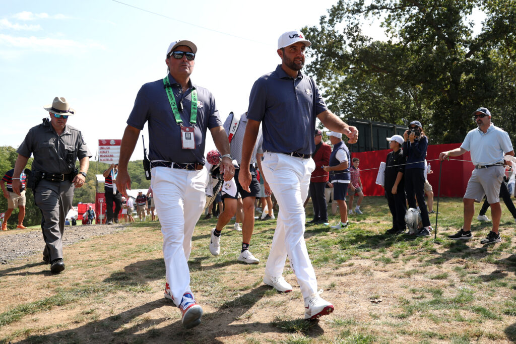 Kevin Kisner walks with Scottie Scheffler during a practice round ahead of the Ryder Cup