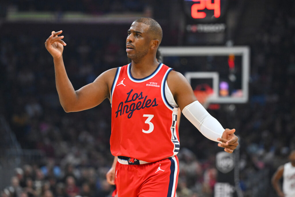 Chris Paul #3 of the Los Angeles Clippers talks to a teammate during the second quarter against the Cleveland Cavaliers at Rocket Arena.