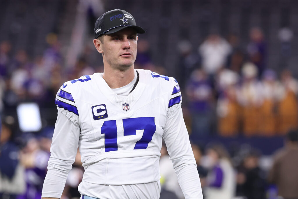 Brandon Aubrey #17 of the Dallas Cowboys walks off the field after the game against the Minnesota Vikings at AT&T Stadium.