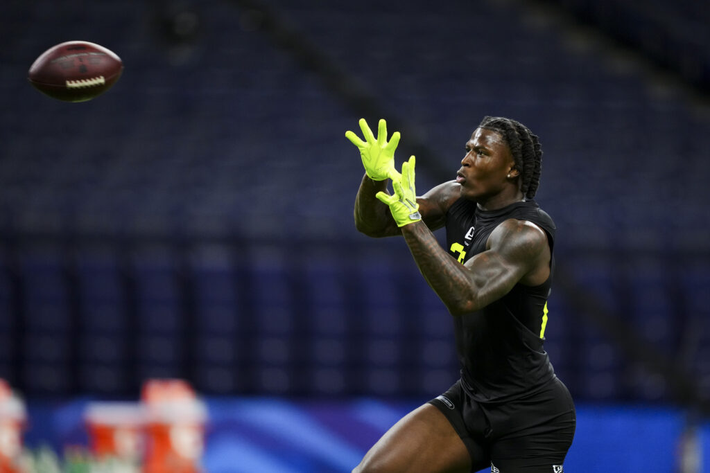 Arvell Reese #LB20 of Ohio State participates in a drill during the 2026 NFL Scouting Combine at Lucas Oil Stadium.