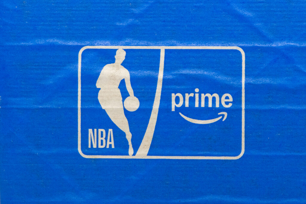 A close up view of the NBA on Prime Video logo on tape branded with the logo on an Amazon Prime package.