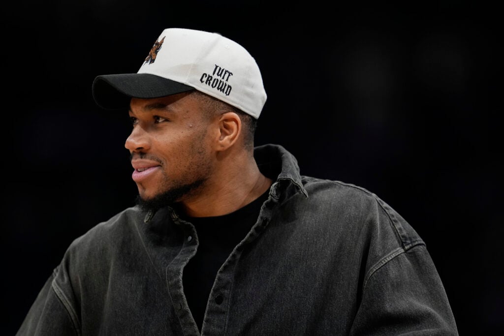Giannis Antetokounmpo #34 of the Milwaukee Bucks looks on against the Dallas Mavericks during the third quarter at Fiserv Forum.