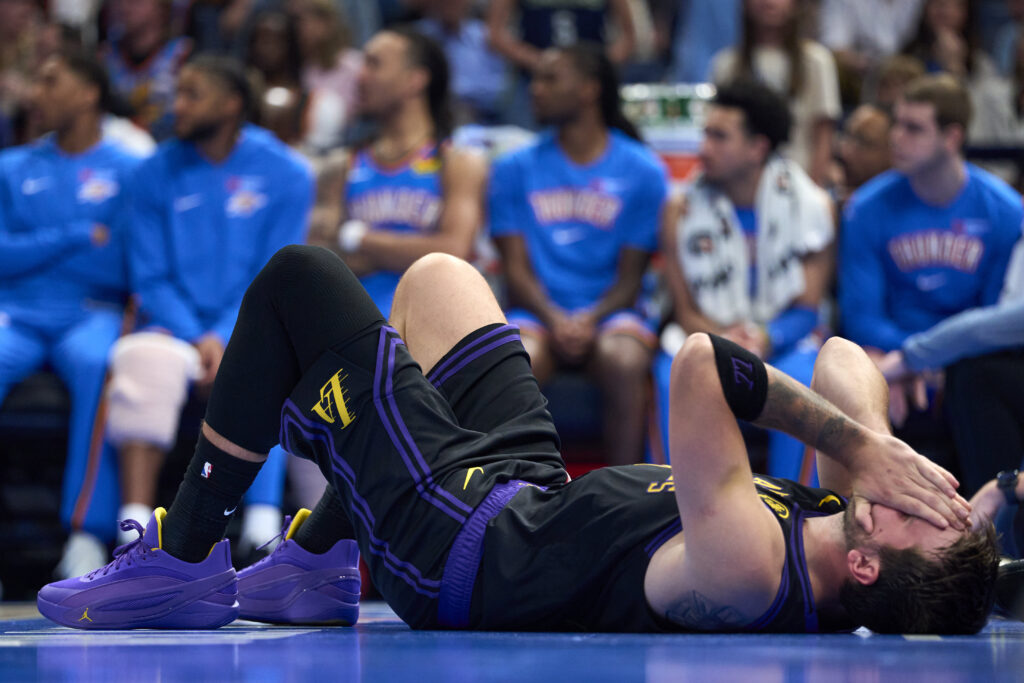 Luka Doncic #77 of the Los Angeles Lakers reacts after a play during the second half against the Oklahoma City Thunder at the Paycom Center.