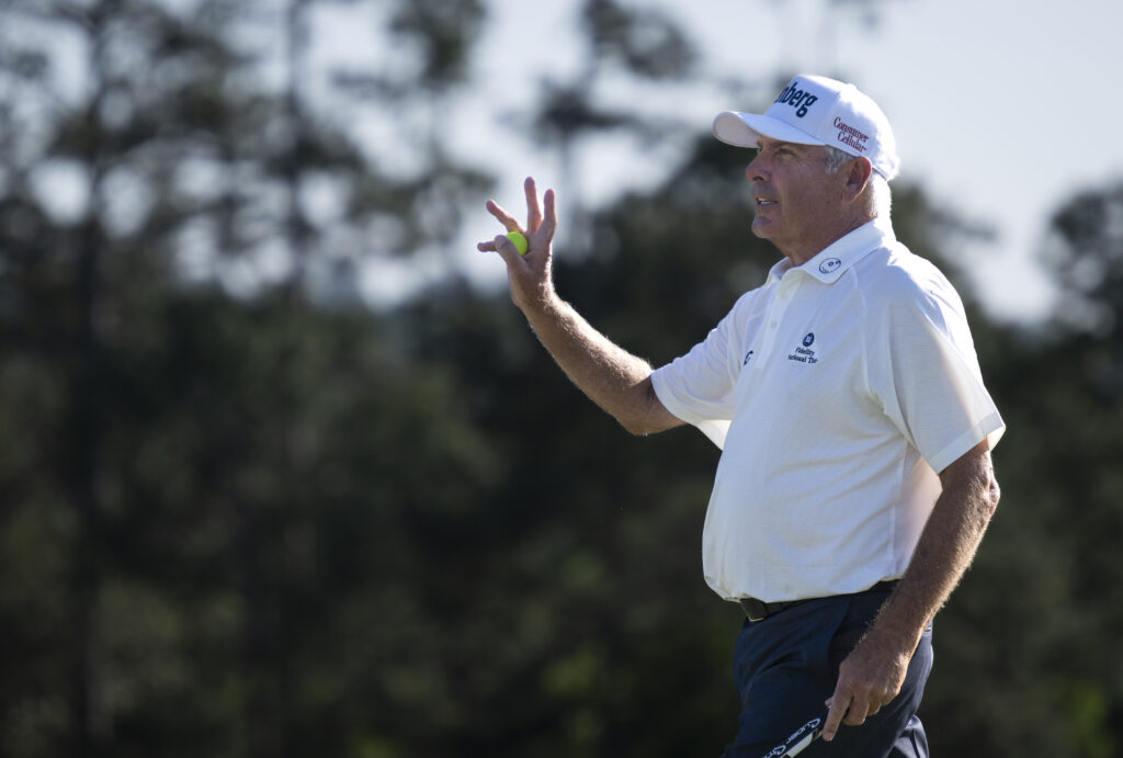 Fred Couples reacts on the No. 18 green during the first round of the Masters at Augusta National