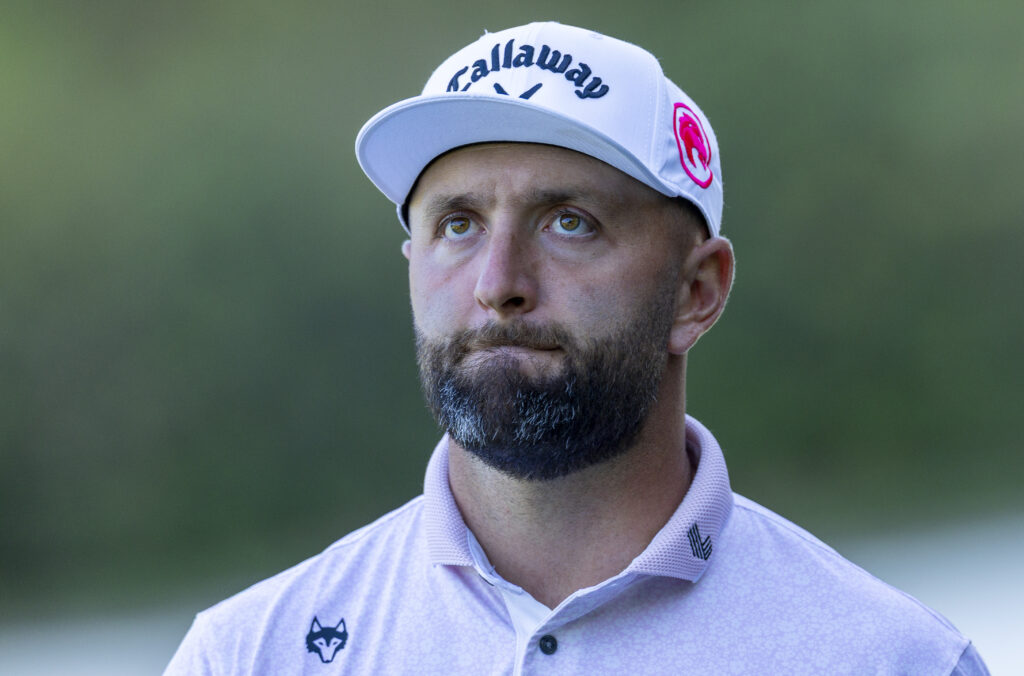 Jon Rahm looks on during the first round of The Masters