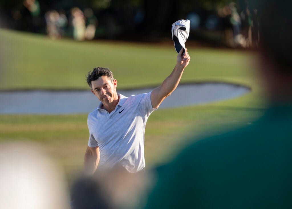 Masters champion Rory McIlroy of Northern Ireland acknowledges the patrons on the No. 18 hole during the second round of the Masters at Augusta National Golf Club