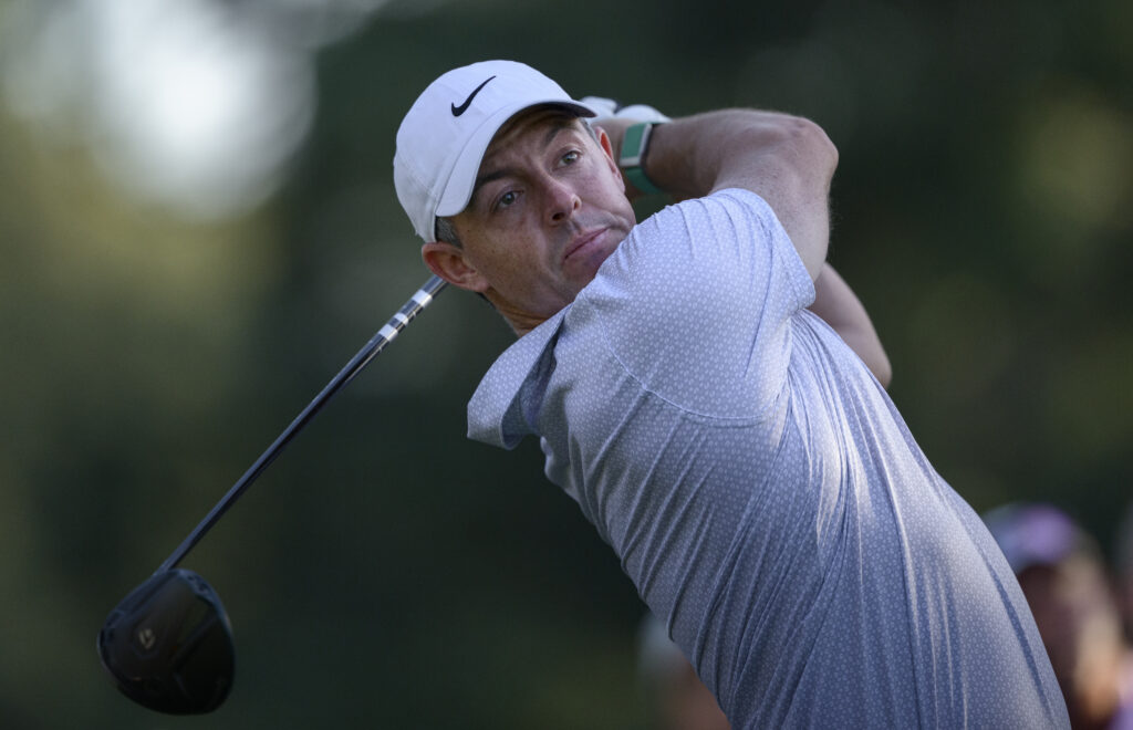 Masters champion Rory McIlroy of Northern Ireland plays a stroke from the No. 18 tee during the second round of the Masters at Augusta National Golf Club