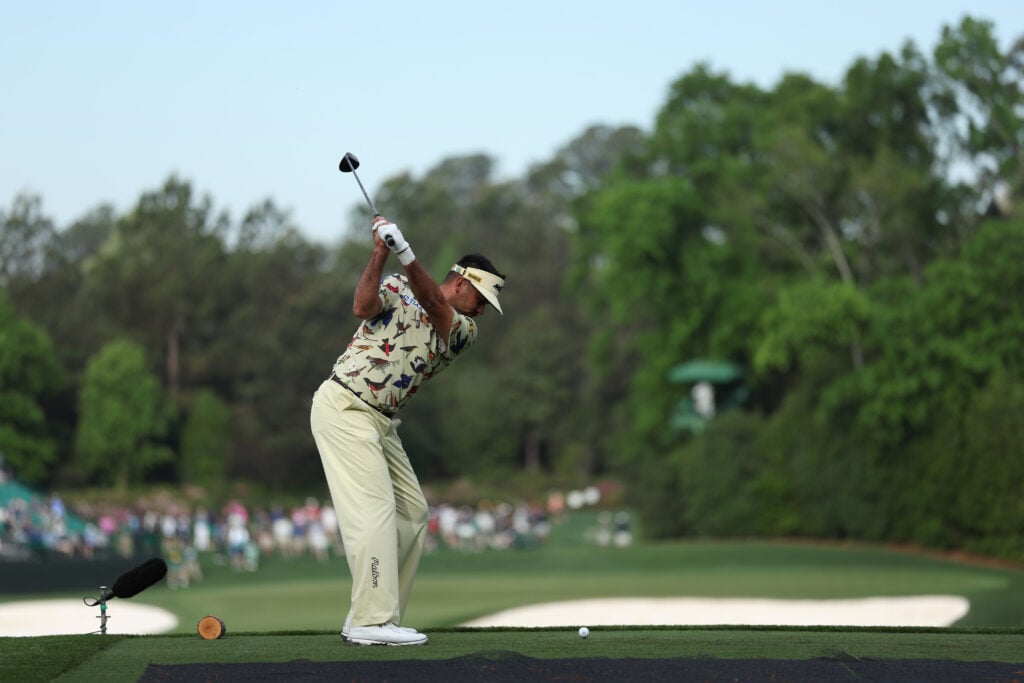 Jason Day of Australia plays a shot from the fourth hole tee box during a practice round prior to the 2026 Masters Tournament at Augusta National Golf Club