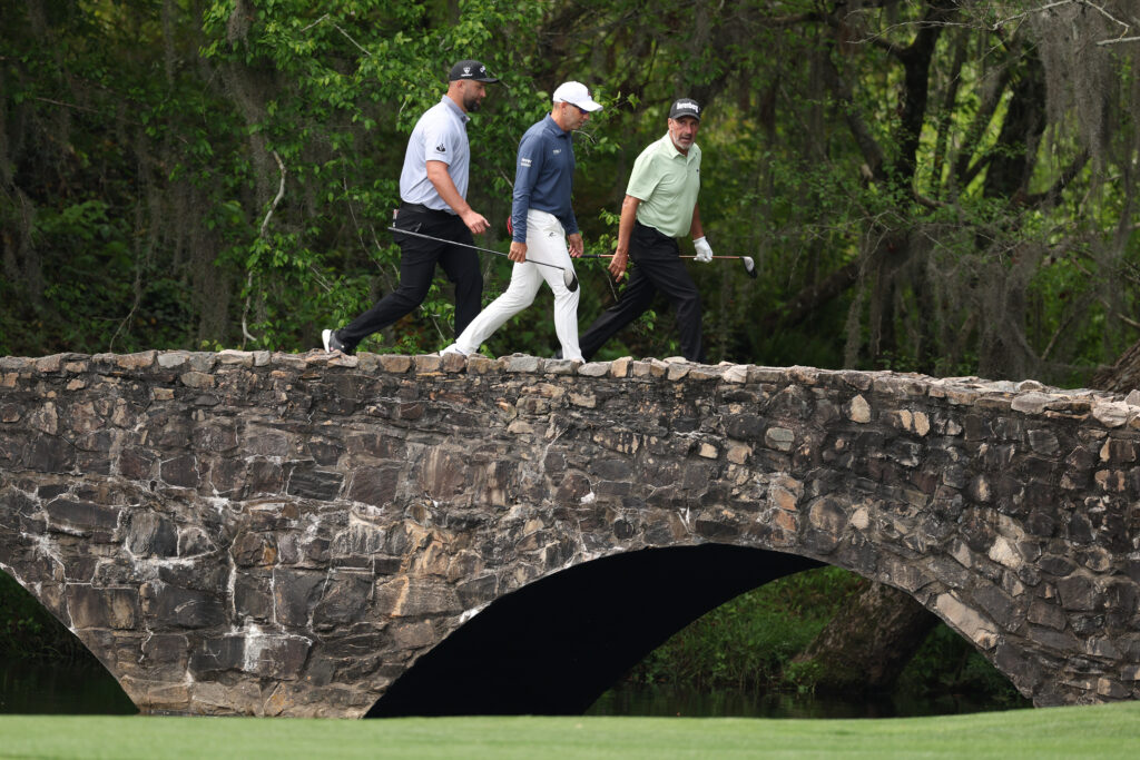 Sergio Garcia of Spain, José María Olazábal of Spain, Jon Rahm of Spain walk the course during a practice round prior to the 2026 Masters Tournament at Augusta National Golf Club